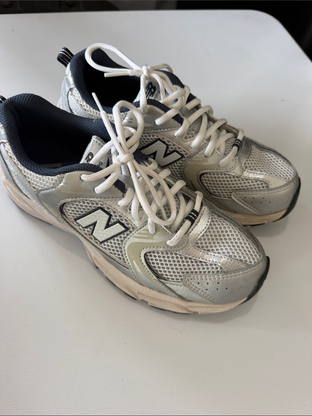New Balance Silver and White Athletic Sneakers